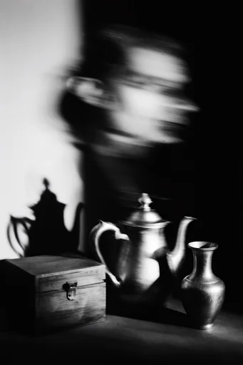 Spectral Kinetic Noir style reference image — motion blur portrait