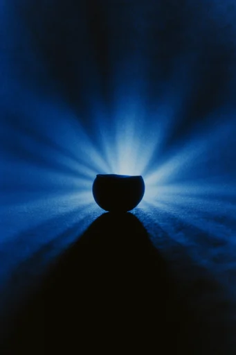 Monochromatic Cobalt Noir style reference image — volumetric blue light
