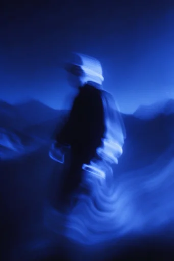 Spectral Cobalt Motion style reference image — heavy film grain