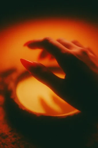 Cinematic Amber Noir style reference image — cinematic chiaroscuro