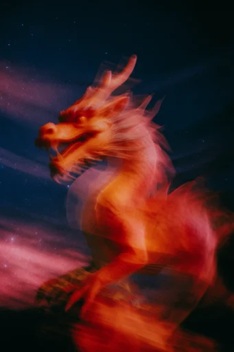 Kinetic Nocturnal Amber style reference image — ethereal light trails