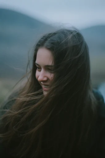Muted Cinematic Intimacy style reference image — melancholic mood