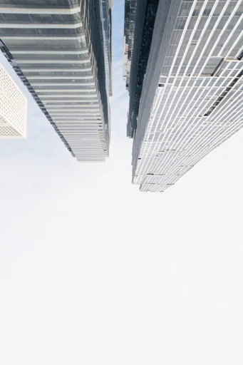 Minimalist Aerial Surrealism style reference image — top-down aerial perspective