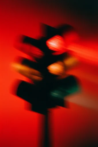 Crimson Nocturnal Blur style reference image — shutter drag