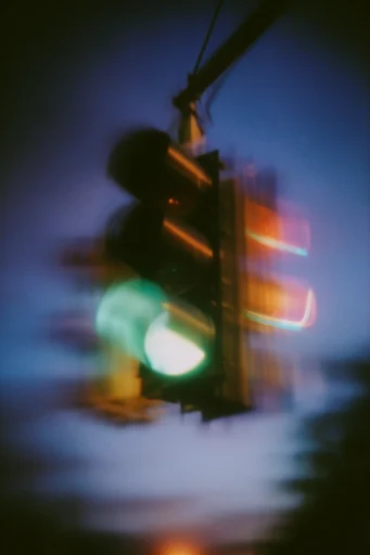 Cinematic Nocturnal Blur style reference image — moody urban night