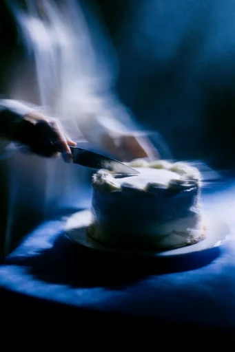 Ethereal Nocturnal Noir style reference image — long exposure light streaks