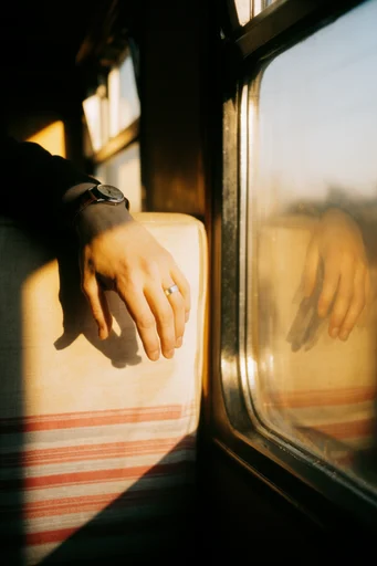 Amber Transit Nostalgia style reference image — long dramatic shadows