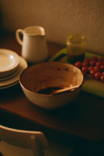 Analog Cinematic Nostalgia style reference image — heavy film grain