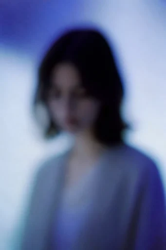 Ethereal Liminal Haze style reference image — dreamlike blurred silhouettes