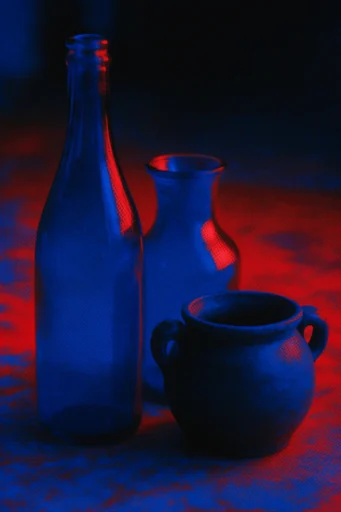 Neon Noir Tactile style reference image — high-contrast chiaroscuro