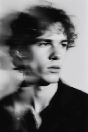 Haunting Kinetic Monochrome style reference image — ethereal portraiture