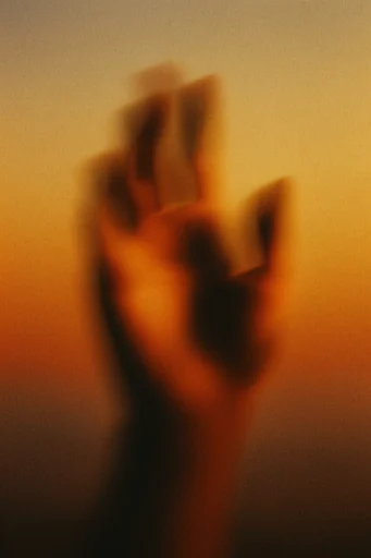 Kinetic Amber Dreamscape style reference image — heavy film grain