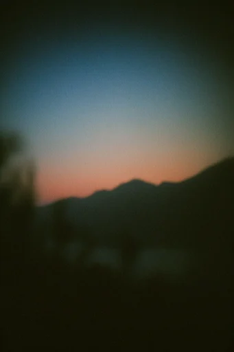 Atmospheric Twilight Nostalgia style reference image — analog film grain