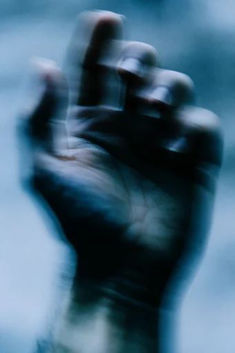 Spectral Motion Noir style reference image — shutter drag