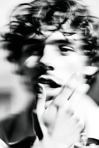 Kinetic Spectral Noir style reference image — shutter drag