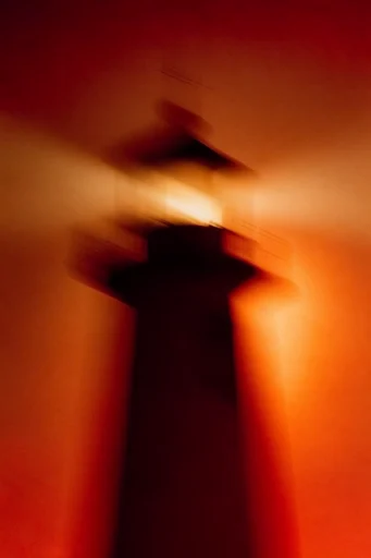 Kinetic Crimson Silhouette style reference image — fiery amber glow