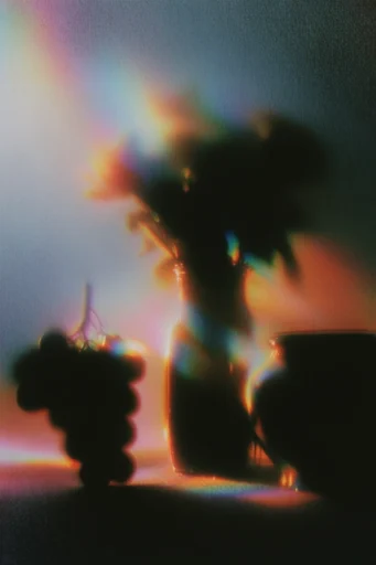 Ethereal Prismatic Nostalgia style reference image — vintage film grain