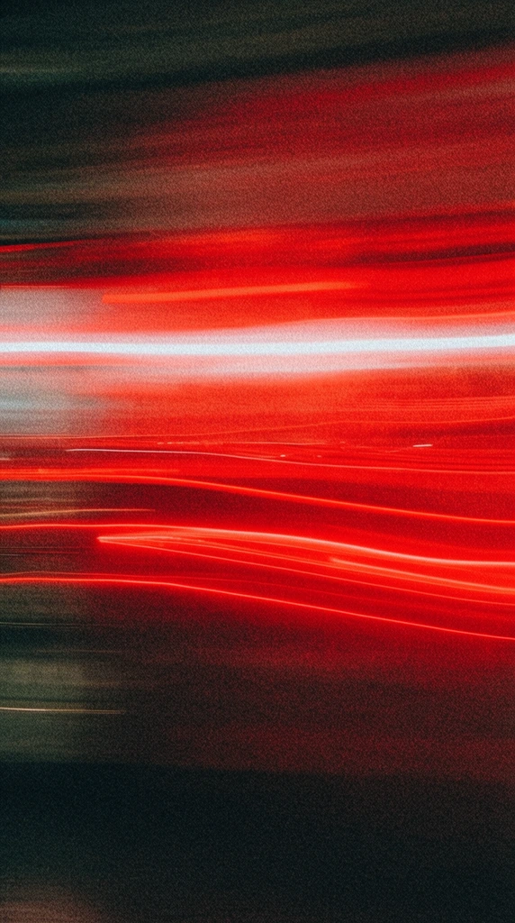 abstract long exposure photography, horizontal motion blur, intense red neon light trails, glowing white streak, dark background, heavy film grain