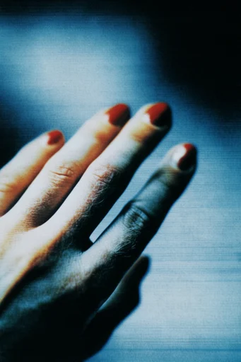 Cinematic Solar Noir style reference image — analog film grain