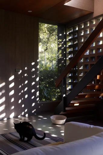 Biophilic Organic Brutalism style reference image — sculptural concrete