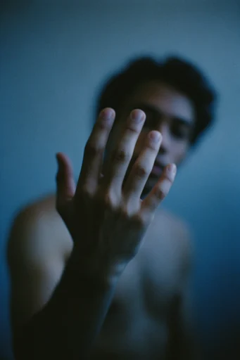 Distorted Cinematic Melancholia style reference image — low-key cinematic lighting