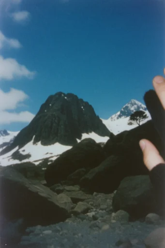 Analog Surrealist Nostalgia style reference image — analog film grain