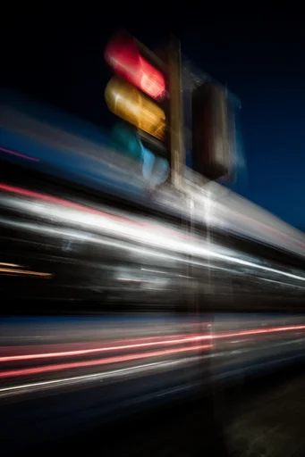 Kinetic Noir Nocturne style reference image — dynamic light streaks