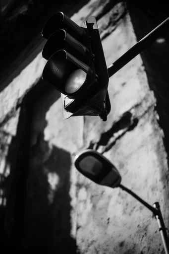 Monochrome Shadow Architecture style reference image — dramatic chiaroscuro