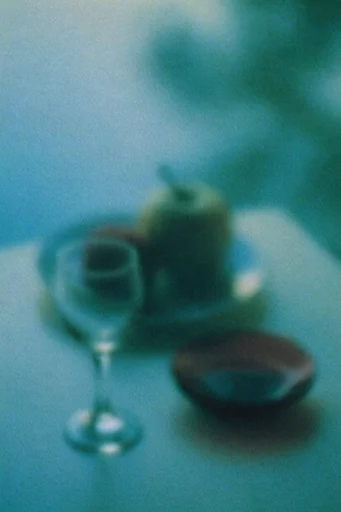 Ethereal Nocturnal Blur style reference image — heavy analog film grain