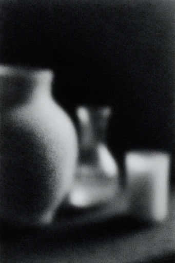 Ethereal Noir Kineticism style reference image — extreme chiaroscuro