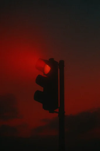 Crimson Cosmic Noir style reference image — glowing crimson light