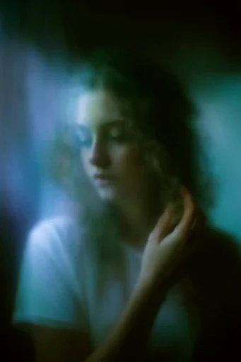 Ethereal Nocturnal Haze style reference image — teal and green color grade
