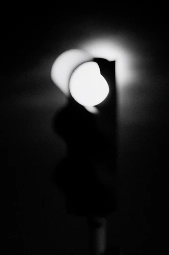 Ethereal Nocturnal Minimalism style reference image — low-key lighting
