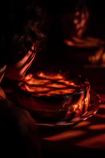 Cinematic Amber Noir style reference image — fiery red and warm orange palette