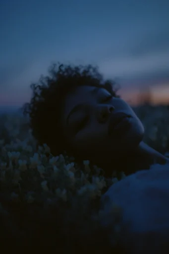 Cinematic Nocturnal Introspection style reference image — urban nocturnal bokeh