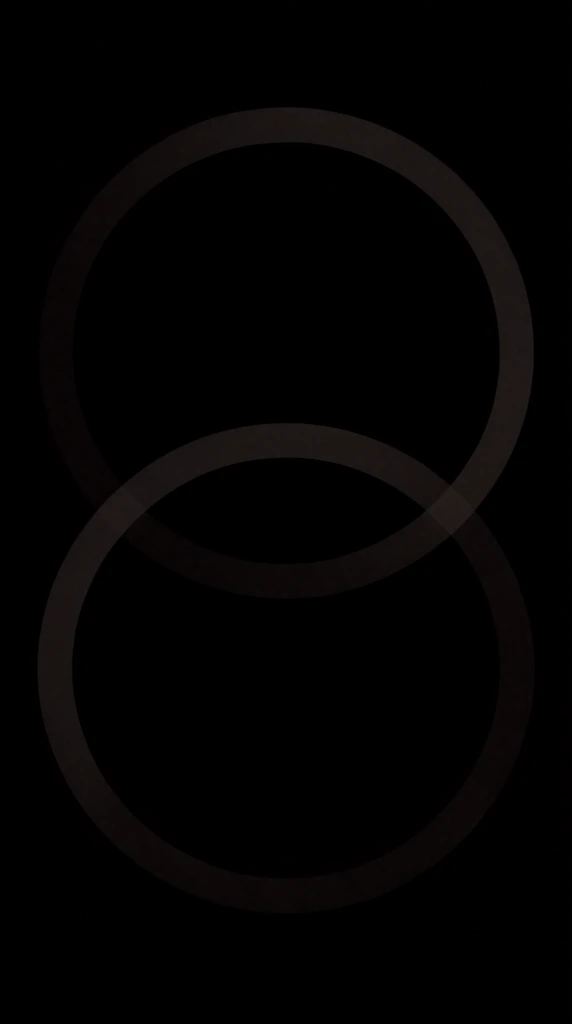 A minimalist, deep black composition featuring two large, vertically oriented interlocking loops dominating the center of a pitch-black void. The overlapping continuous bands are extremely faint, rendered in a translucent, muted brownish-grey hue that barely registers against the dark background. The circular pathways intertwine symmetrically, creating a subtle geometric focal point within the expansive negative space. The image relies entirely on minuscule shifts in tonal values to separate the barely visible, softly textured intersecting rings from the absolute darkness surrounding them, creating a stark, monochromatic, and highly atmospheric abstract visual experience.