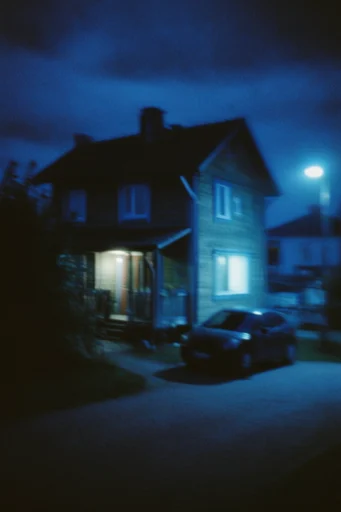 Cinematic Nocturnal Noir style reference image — soft bokeh city lights