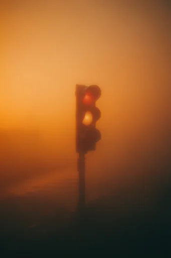 Amber Atmospheric Solitude style reference image — cinematic backlit silhouette