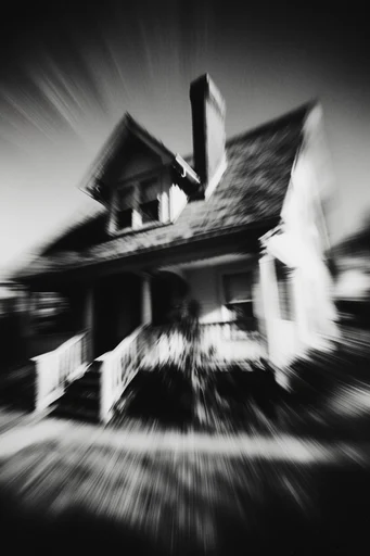 Monochrome Kinetic Vertigo style reference image — radial vortex distortion