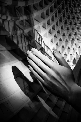 Monolithic Brutalist Noir style reference image — dramatic low-angle perspective
