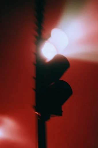 Ethereal Crimson Noir style reference image — saturated crimson background