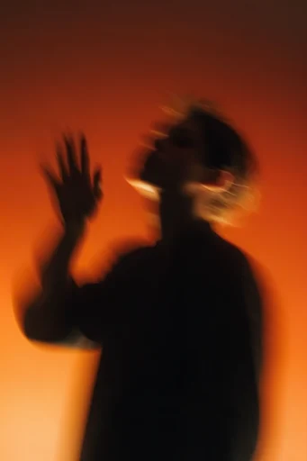 Crimson Kinetic Noir style reference image — cinematic thriller atmosphere