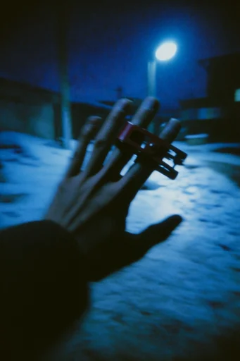 Cinematic Nocturnal Noir style reference image — deep blue and cyan color grading