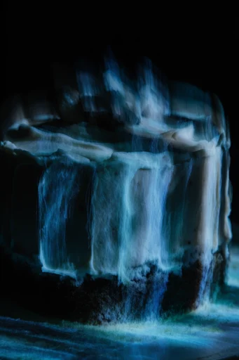 Luminescent Spectral Glitch style reference image — grainy film aesthetic