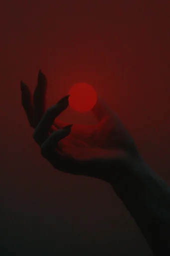 Crimson Cosmic Noir style reference image — heavy film grain