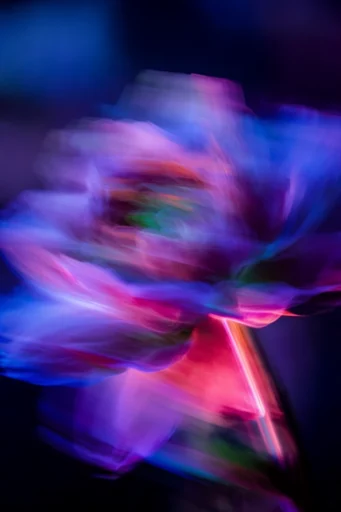 Kinetic Spectral Luminescence style reference image — high contrast dark background
