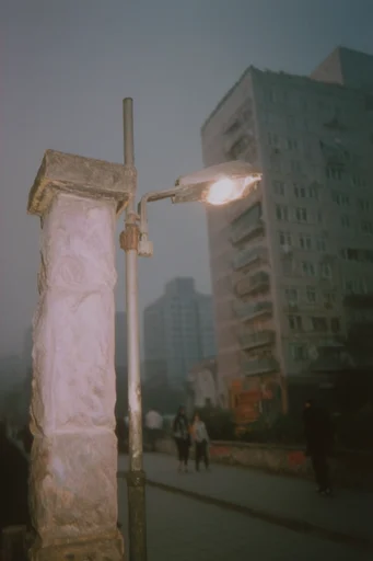 Uncanny Analog Surrealism style reference image — vintage analog film grain