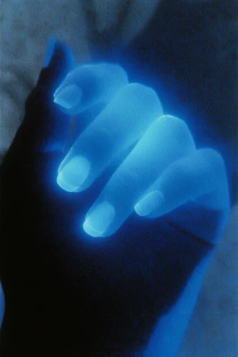 Luminous Cyan Nocturne style reference image — heavy film grain