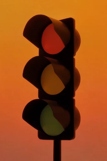 Amber Chiaroscuro Minimalism style reference image — dramatic amber backlighting