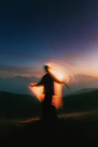 Luminous Twilight Etherealism style reference image — silhouette photography